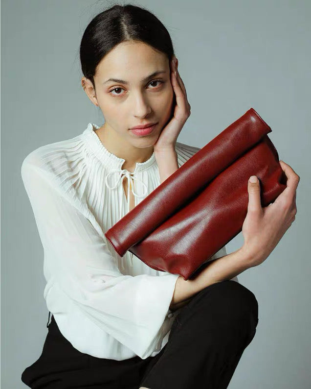Handbag curling envelope